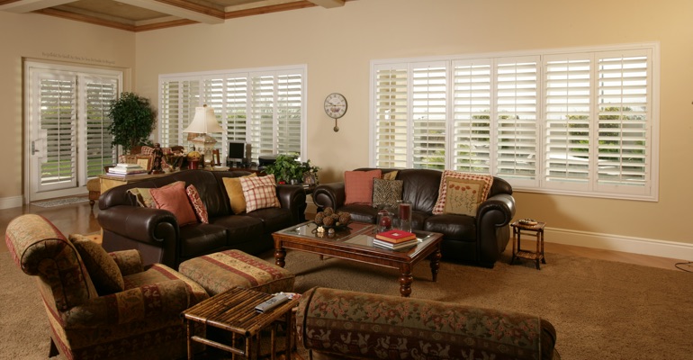 Charlotte sunroom with custom shutters.